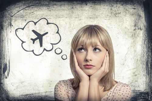 Flugangst Symptome – typische körperliche Reaktionen im Flugzeug